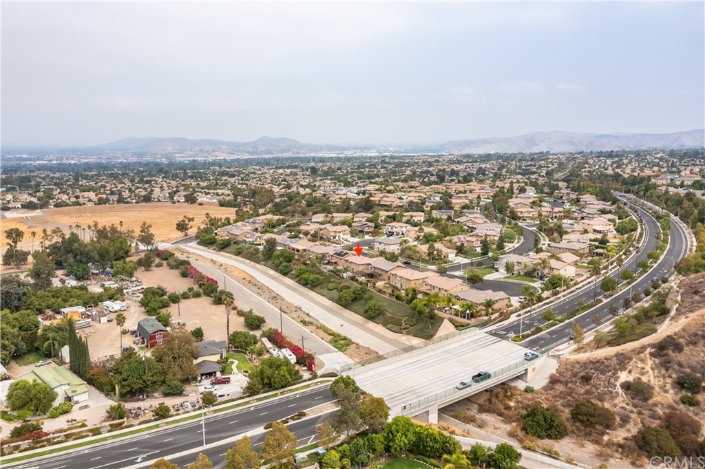 3426 Amethyst Street Corona, CA 92882 - Photo 67 of 72 an aerial view of residential building and ocean view