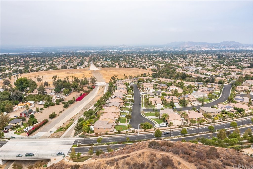 3426 Amethyst Street Corona, CA 92882 - Photo 68 of 72 an aerial view of residential building and ocean