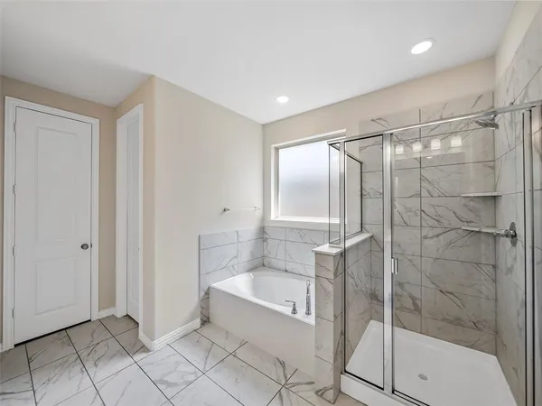 a bathroom with double sink and a mirror