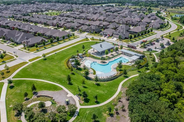 an aerial view of a house with a garden