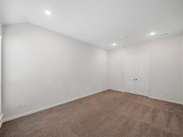 an empty room with a natural light