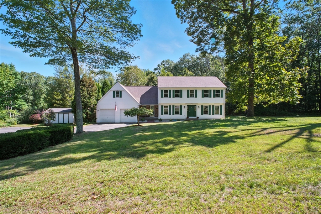 164 Wales Road Monson, MA 01057 - Photo 1 of 41 a front view of a house with a yard