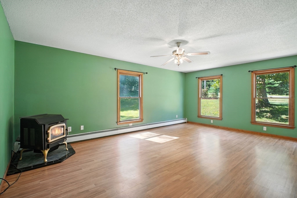 164 Wales Road Monson, MA 01057 - Photo 5 of 41 wooden floor in an empty room with a window