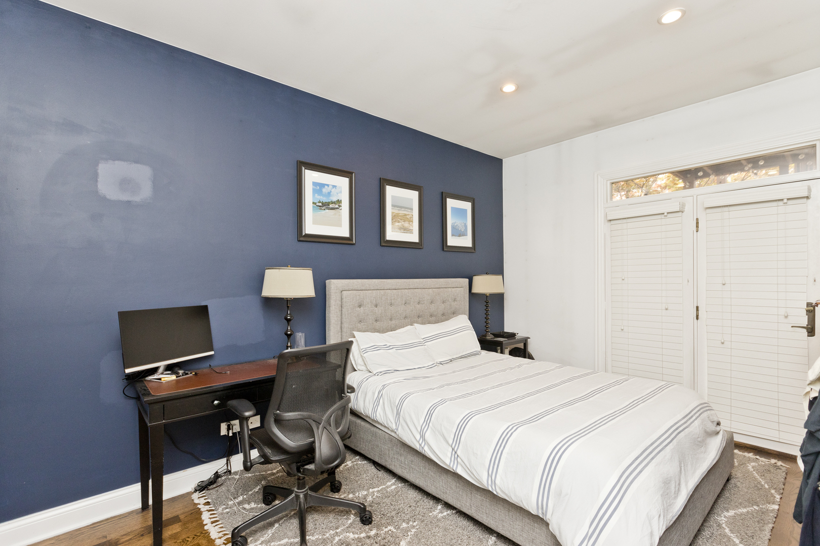 Undisclosed Address Chicago, IL 60614 - Photo 12 of 21 a bedroom with a bed and a desk