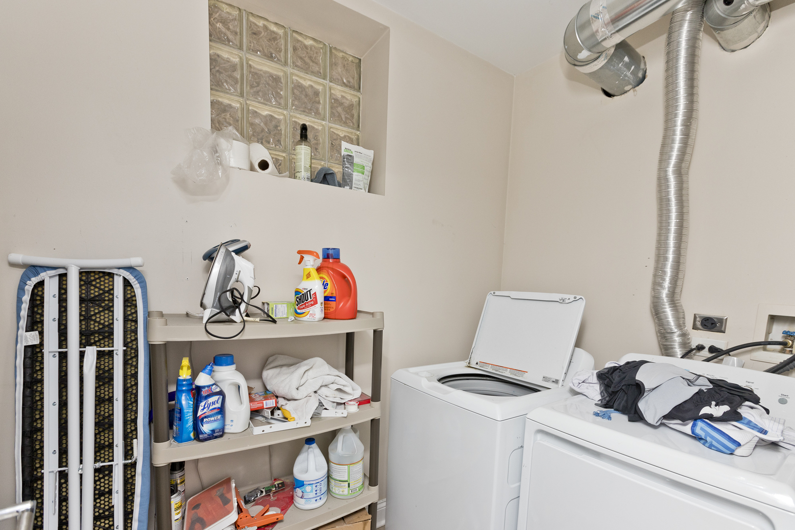 Undisclosed Address Chicago, IL 60614 - Photo 16 of 21 a room with storage and utility