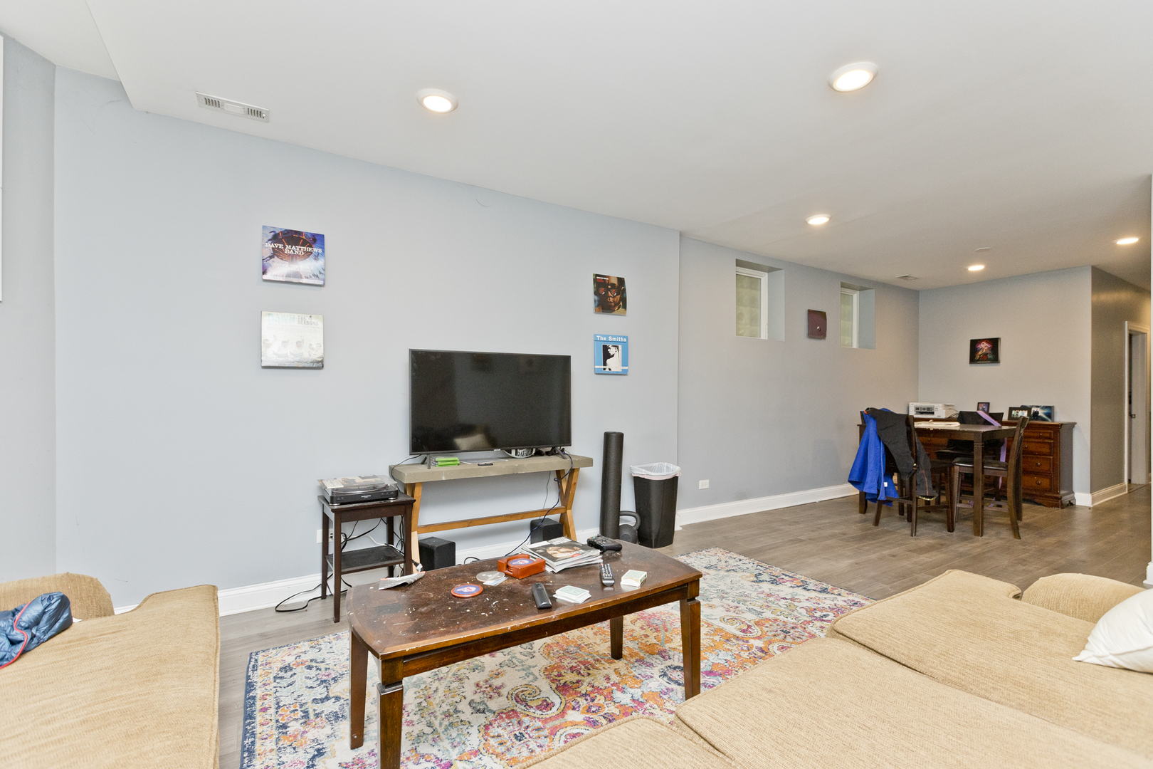 Undisclosed Address Chicago, IL 60614 - Photo 21 of 21 a living room with furniture and a flat screen tv