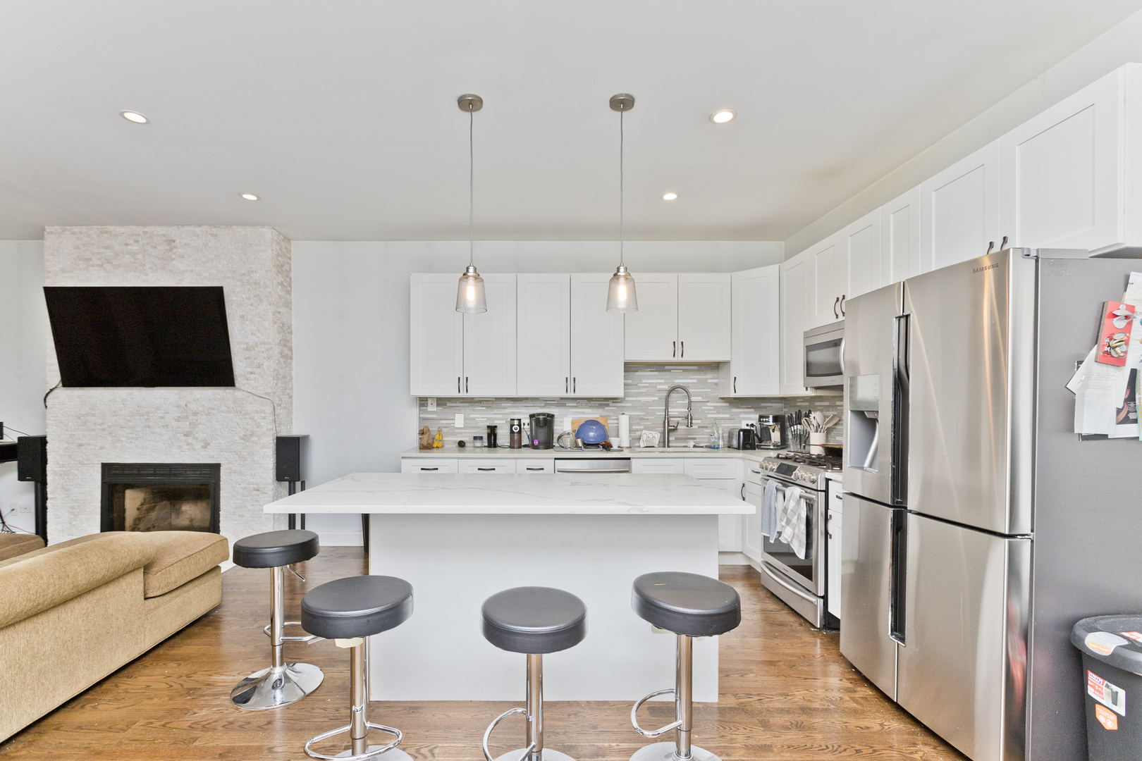 Undisclosed Address Chicago, IL 60614 - Photo 3 of 21 a kitchen with stainless steel appliances granite countertop a refrigerator a stove a sink a microwave and a refrigerator