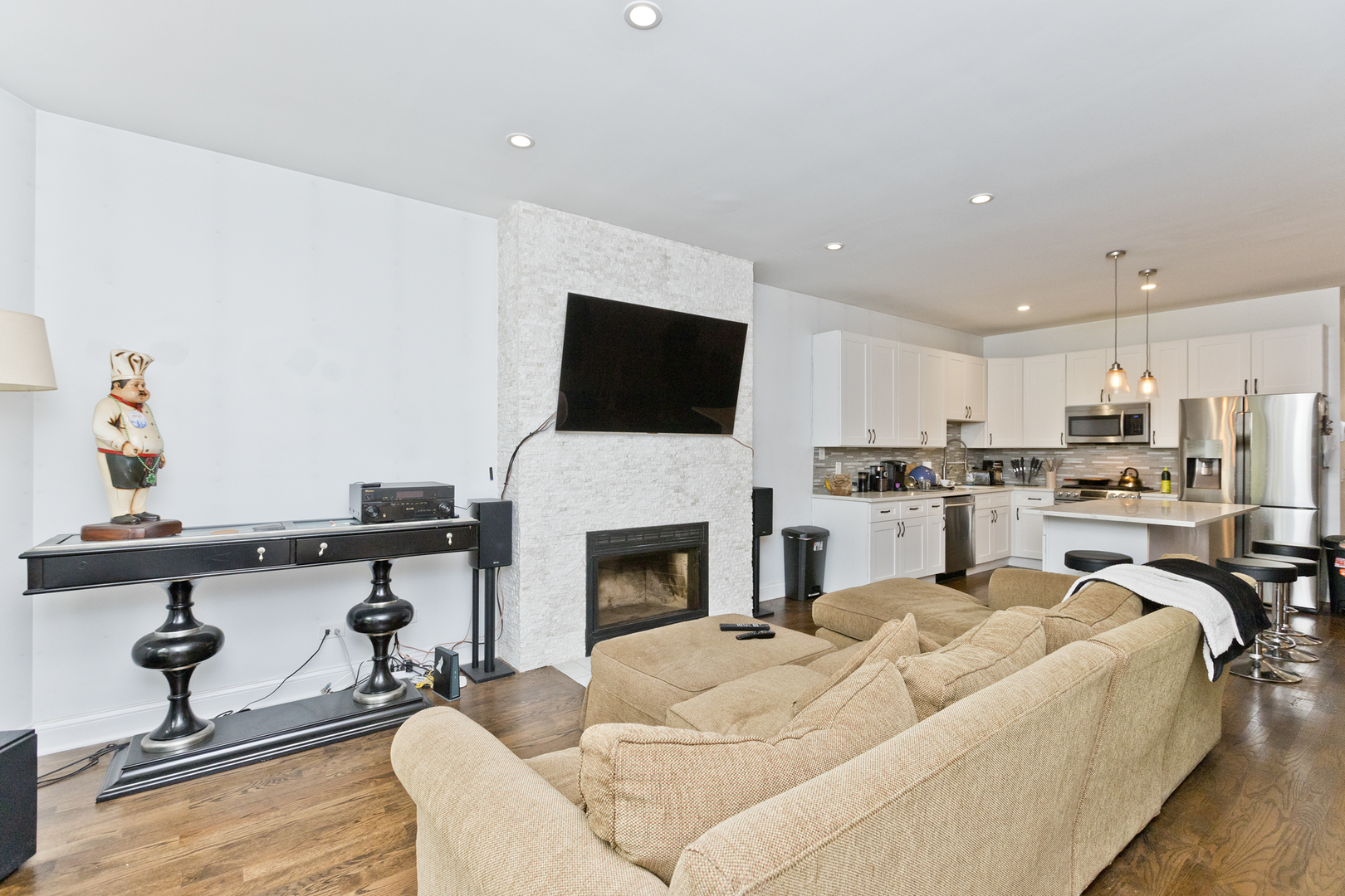 Undisclosed Address Chicago, IL 60614 - Photo 6 of 21 a living room with furniture and a fireplace