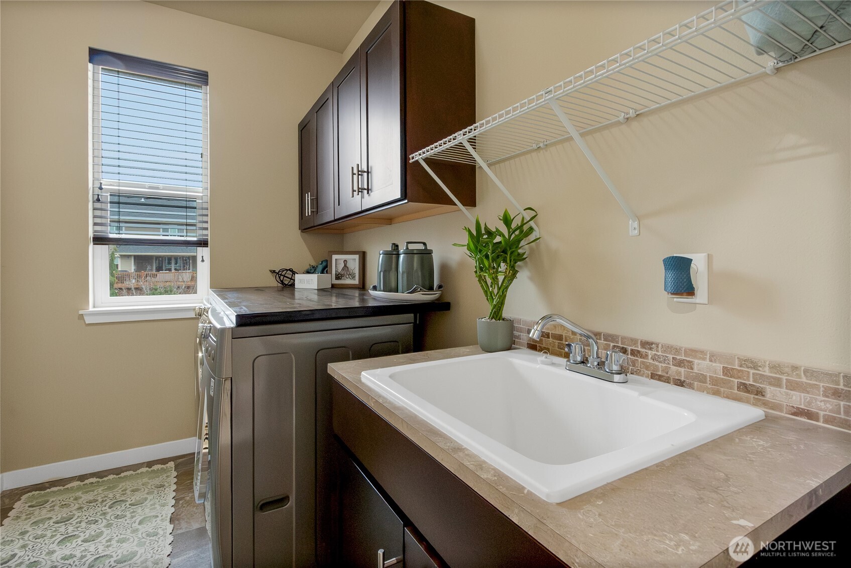 889 Lund Street Buckley, WA 98321 - Photo 15 of 25 a bathroom with a sink and a mirror