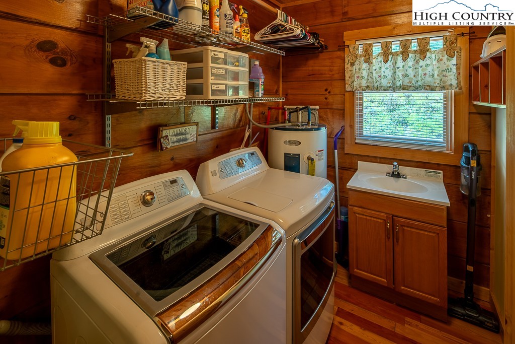 2191 Sorrento Drive Boone, NC 28607 - Photo 19 of 48 a utility room with dryer and washer