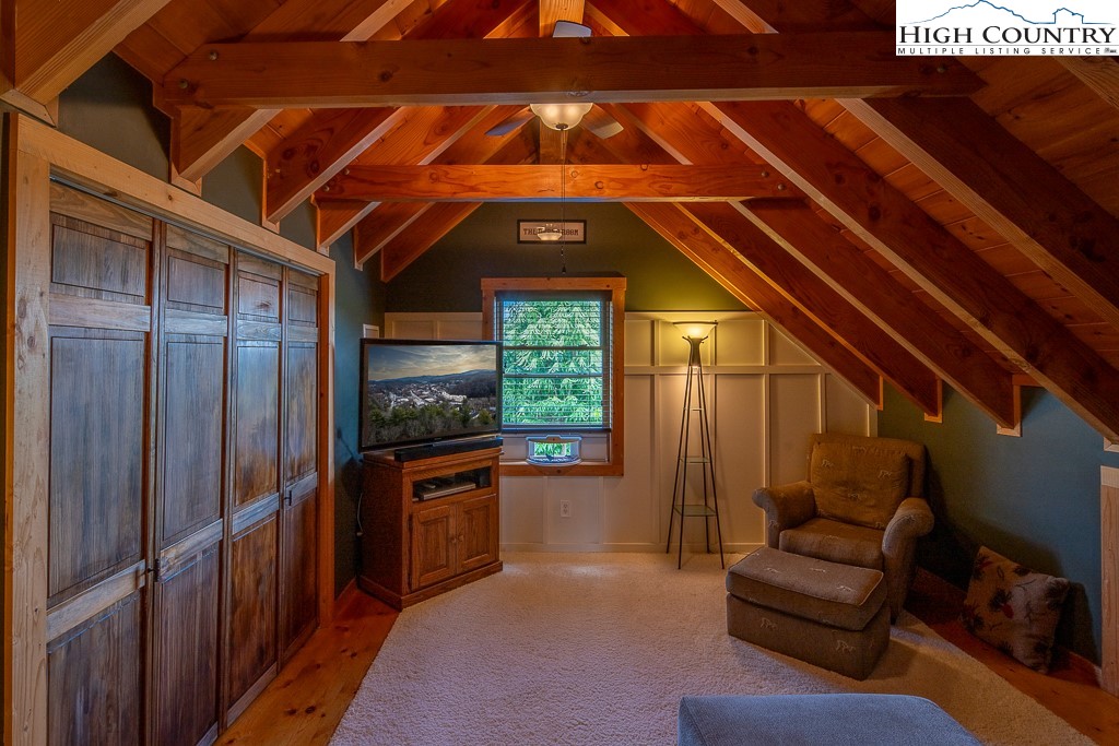 2191 Sorrento Drive Boone, NC 28607 - Photo 24 of 48 a view of a livingroom with furniture and staircase
