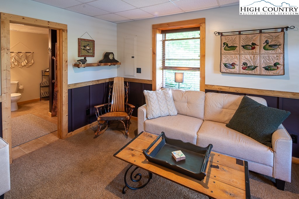 2191 Sorrento Drive Boone, NC 28607 - Photo 30 of 48 a living room with furniture and a window