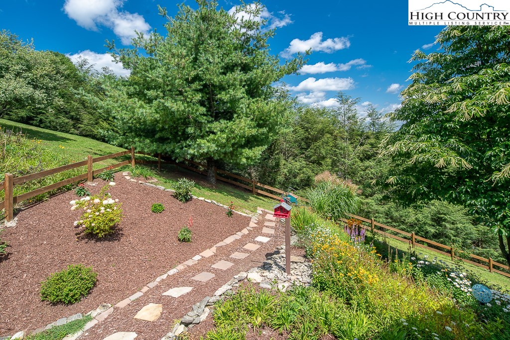 2191 Sorrento Drive Boone, NC 28607 - Photo 40 of 48 a view of a flower in a garden