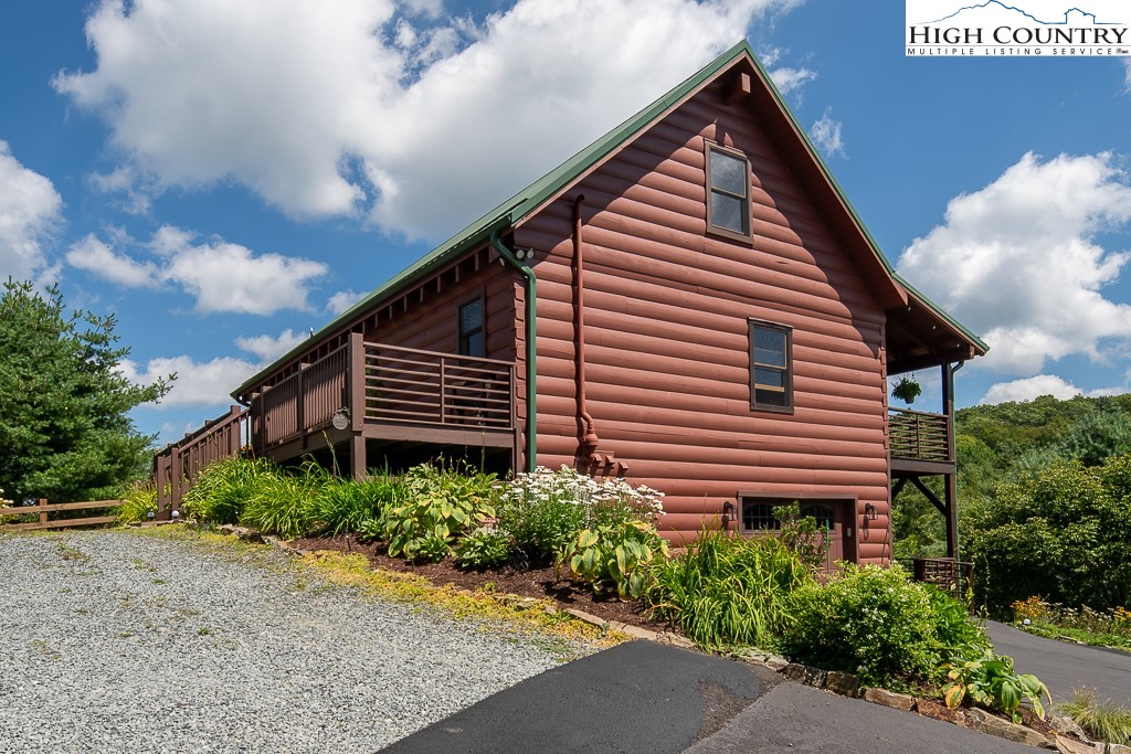 2191 Sorrento Drive Boone, NC 28607 - Photo 43 of 48 a view of a house with a yard