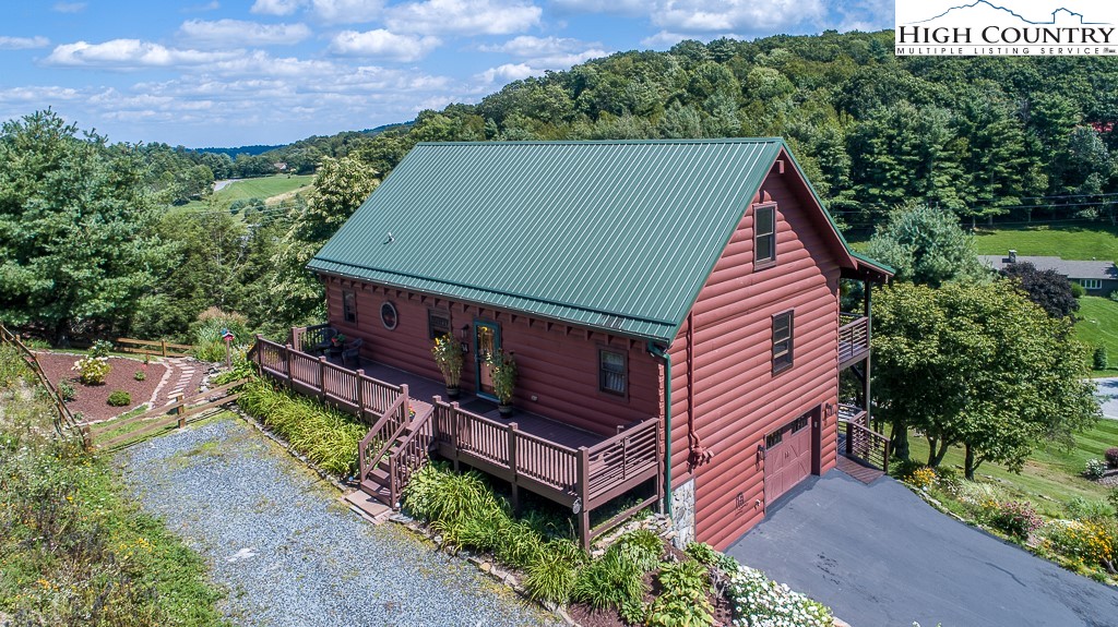2191 Sorrento Drive Boone, NC 28607 - Photo 45 of 48 an aerial view of a house with a yard