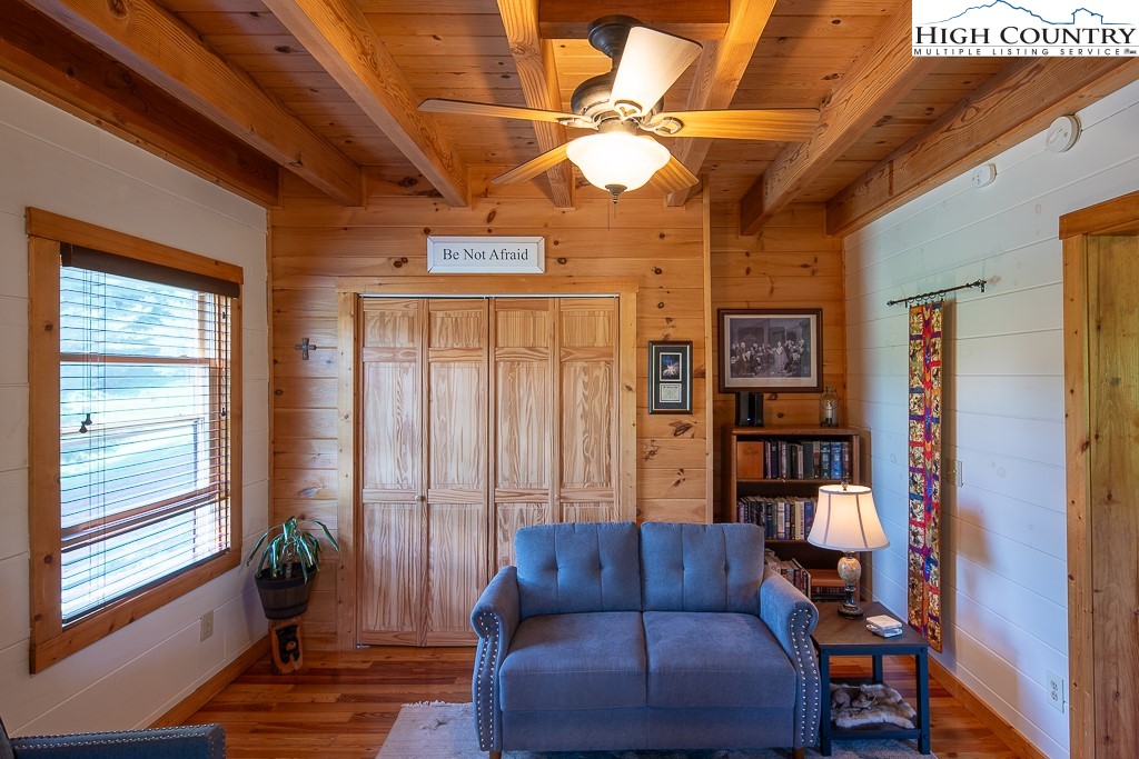 2191 Sorrento Drive Boone, NC 28607 - Photo 8 of 48 a living room with furniture a ceiling fan and a window