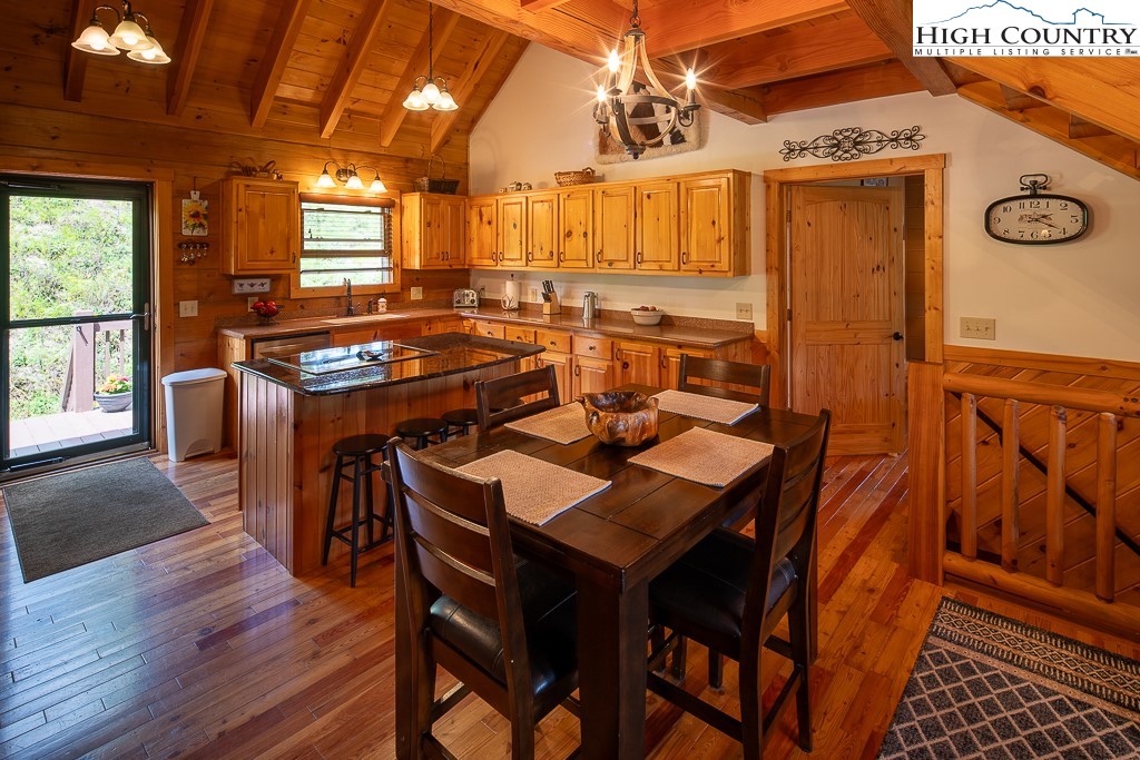 2191 Sorrento Drive Boone, NC 28607 - Photo 9 of 48 a view of a kitchen area with furniture and wooden floor
