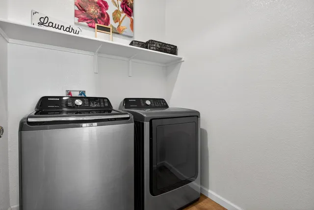 a utility room with dryer and washer