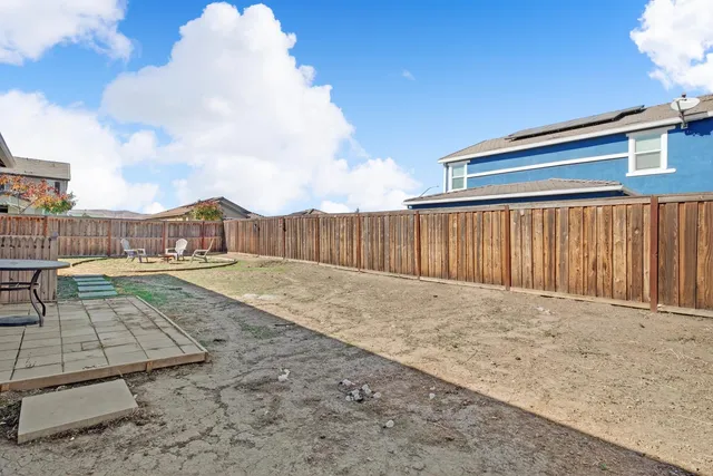 a view of outdoor space with wooden deck