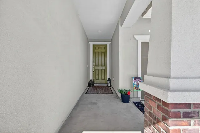 view of hall way with mirror