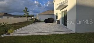 2771 Common Fig Run Wesley Chapel, FL 33543 - Photo 15 of 16 a view of a house with a yard