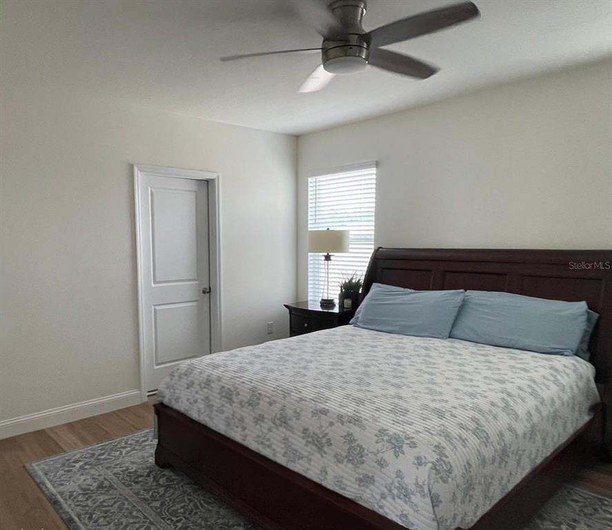 2771 Common Fig Run Wesley Chapel, FL 33543 - Photo 9 of 16 a large bed in a white room