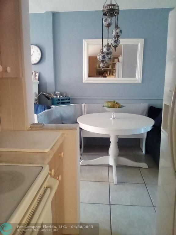 725 Southwest 11th Avenue, Unit 6F Hallandale Beach, FL 33009 - Photo 3 of 12 a bathroom with a sink and a mirror