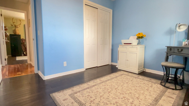 1797 Sunset Road Enoch, UT 84721 - Photo 28 of 80 Dark wood-finish flooring paired with light blue walls and white baseboards