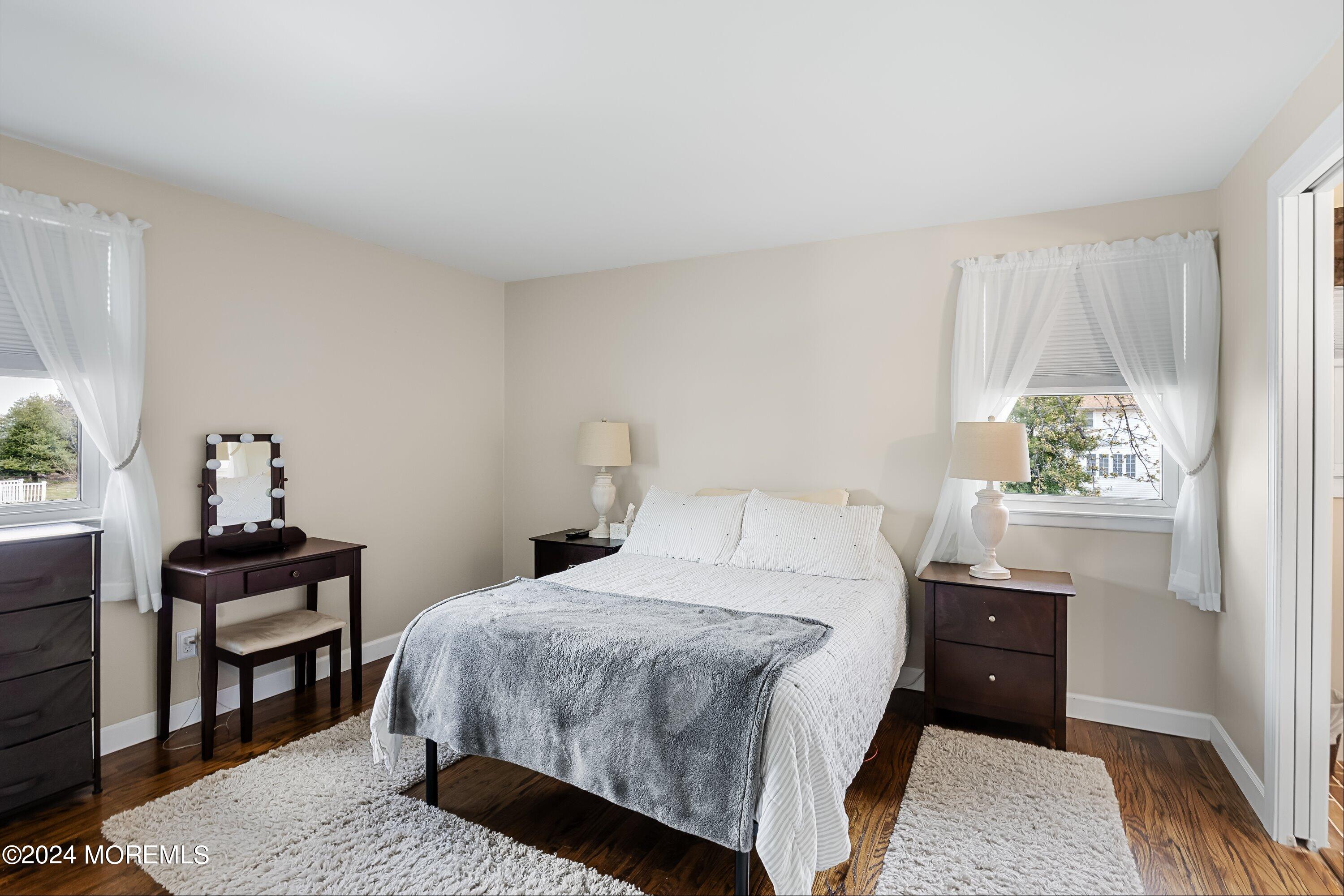 325 Ithaca Avenue Delran, NJ 08075 - Photo 11 of 19 a bedroom with a bed a table and a window