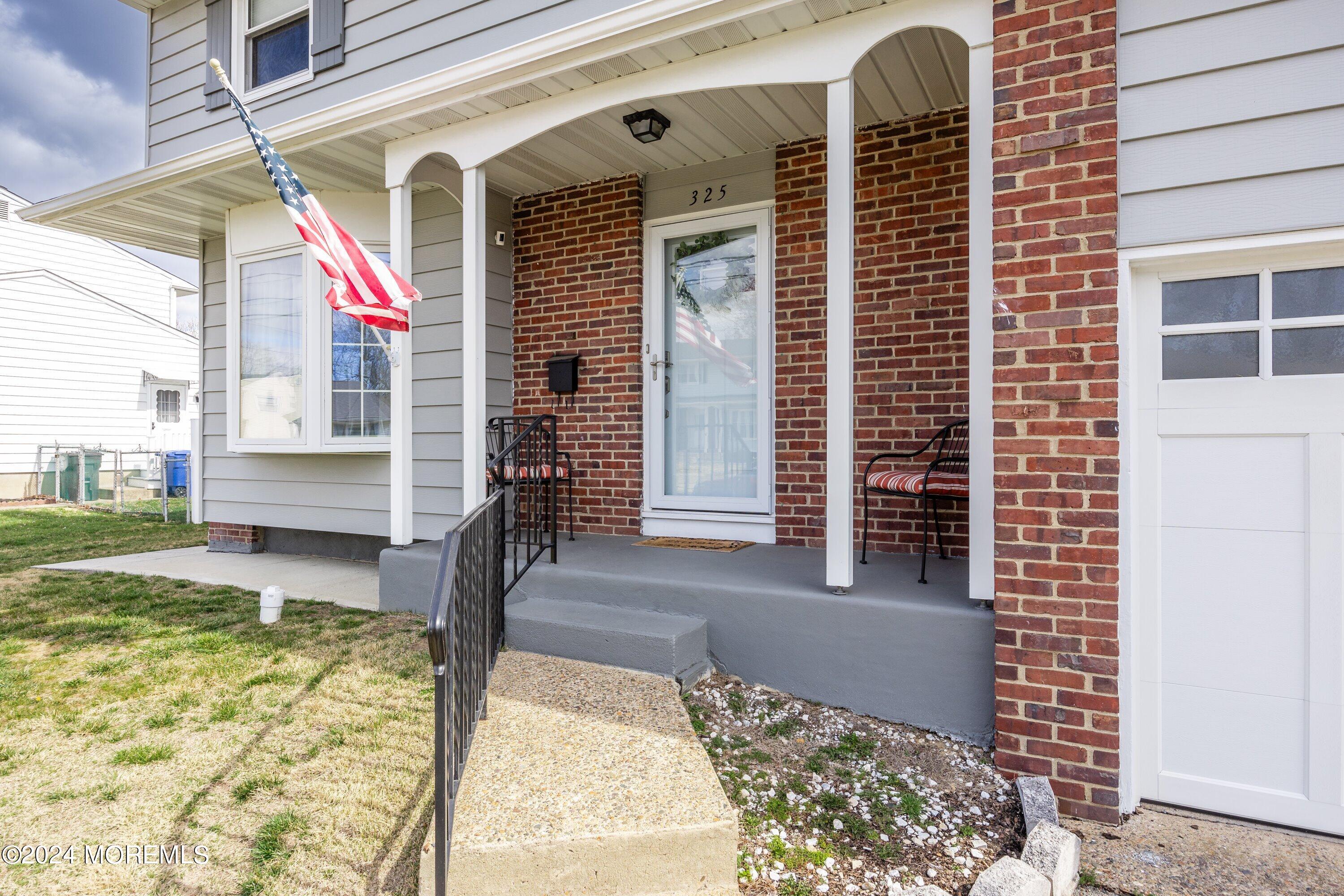 325 Ithaca Avenue Delran, NJ 08075 - Photo 3 of 19 a front view of a house with a yard