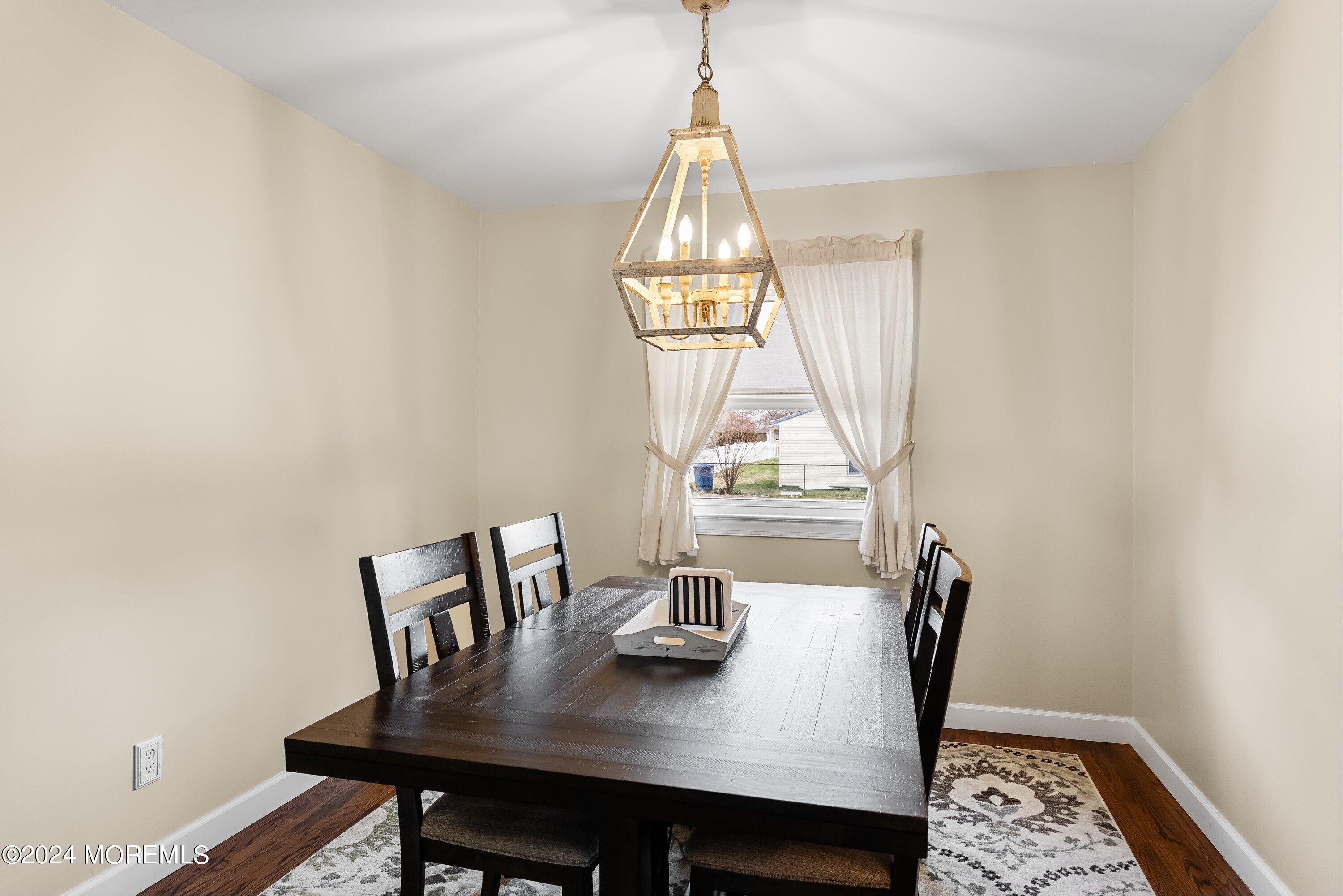 325 Ithaca Avenue Delran, NJ 08075 - Photo 6 of 19 a view of a dining room with furniture window and wooden floor