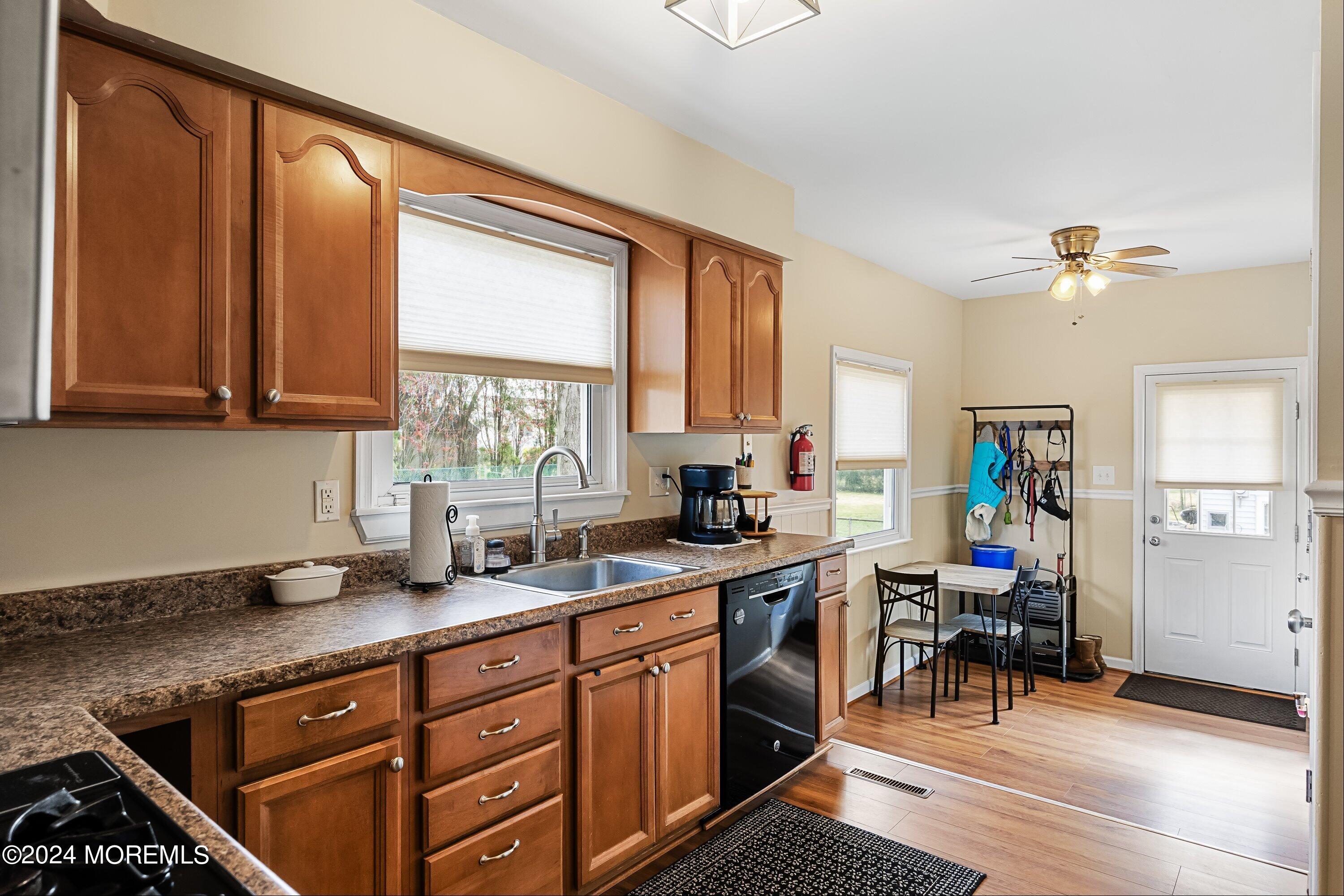 325 Ithaca Avenue Delran, NJ 08075 - Photo 7 of 19 a kitchen with a sink cabinets and window