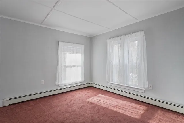 an empty room with window