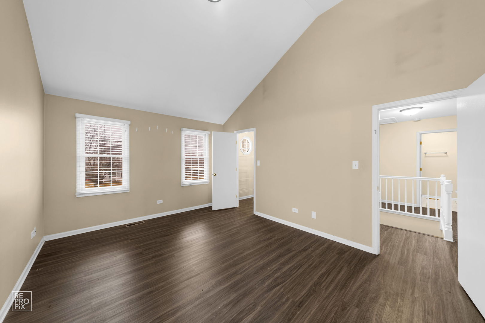 5519 Feather Creek Road Matteson, IL 60443 - Photo 17 of 26 an empty room with wooden floor and windows