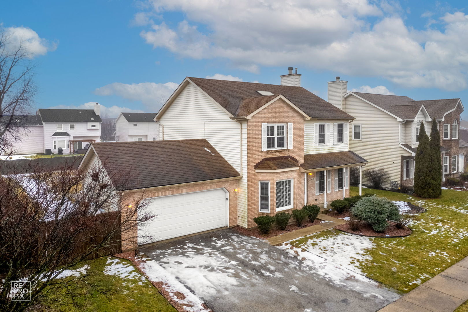 5519 Feather Creek Road Matteson, IL 60443 - Photo 2 of 26 a front view of a house with a yard