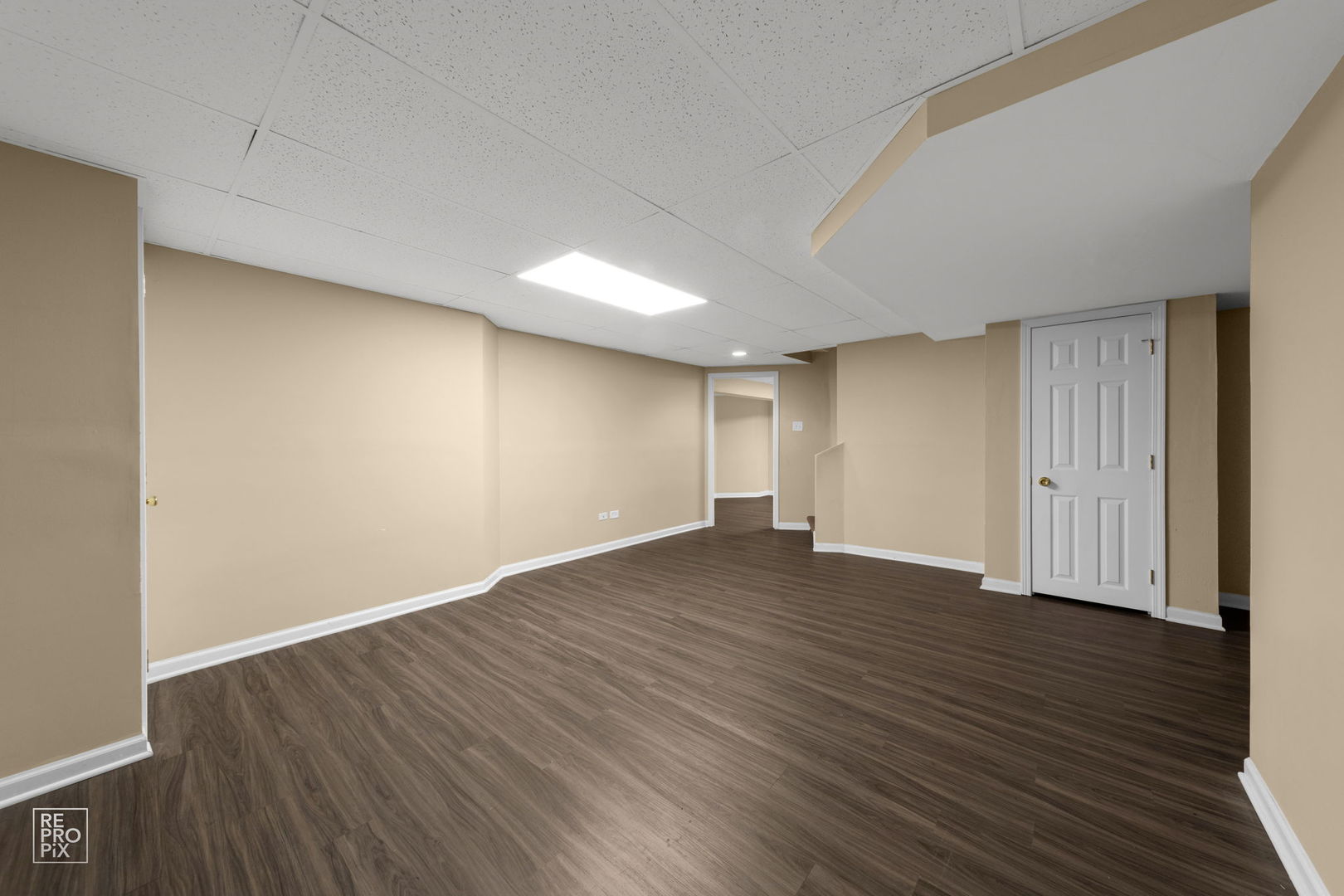 5519 Feather Creek Road Matteson, IL 60443 - Photo 24 of 26 a view of an empty room with wooden floor