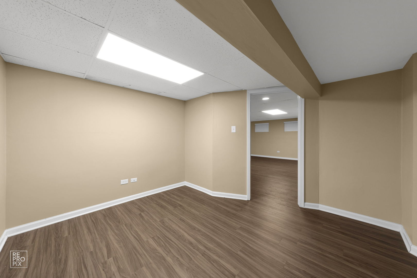 5519 Feather Creek Road Matteson, IL 60443 - Photo 25 of 26 a view of an empty room with wooden floor