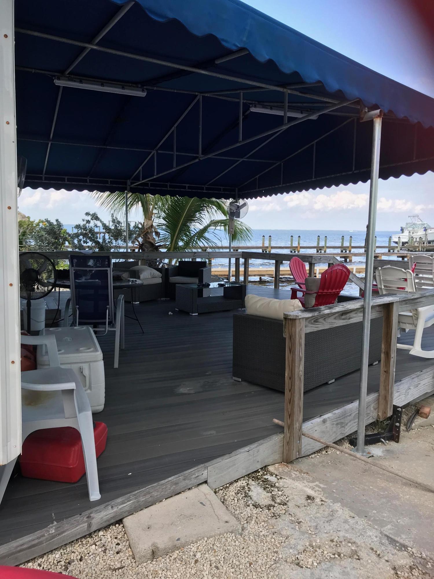 1312 Calder Road Key Largo, FL 33037 - Photo 8 of 10 Large Bayfront Covered Porch