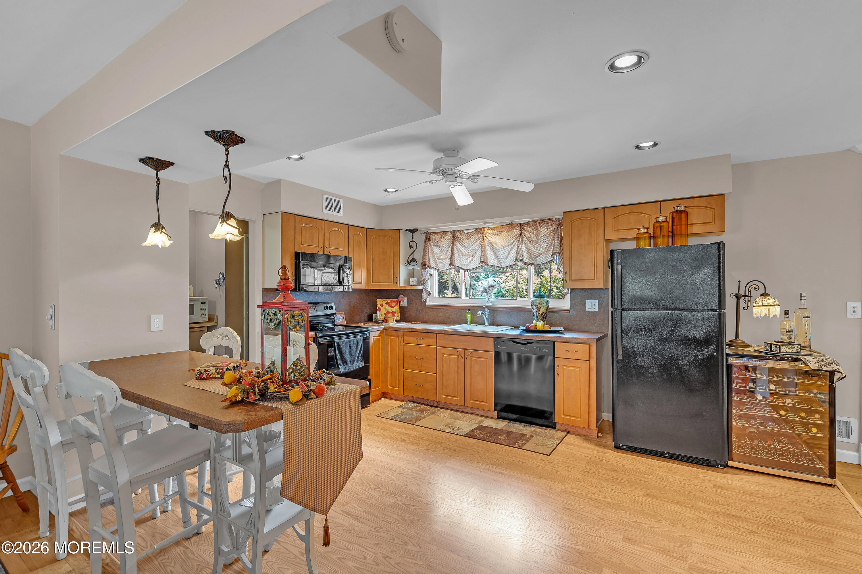 2 Apache Drive Toms River, NJ 08753 - Photo 24 of 75 a kitchen with refrigerator and cabinets