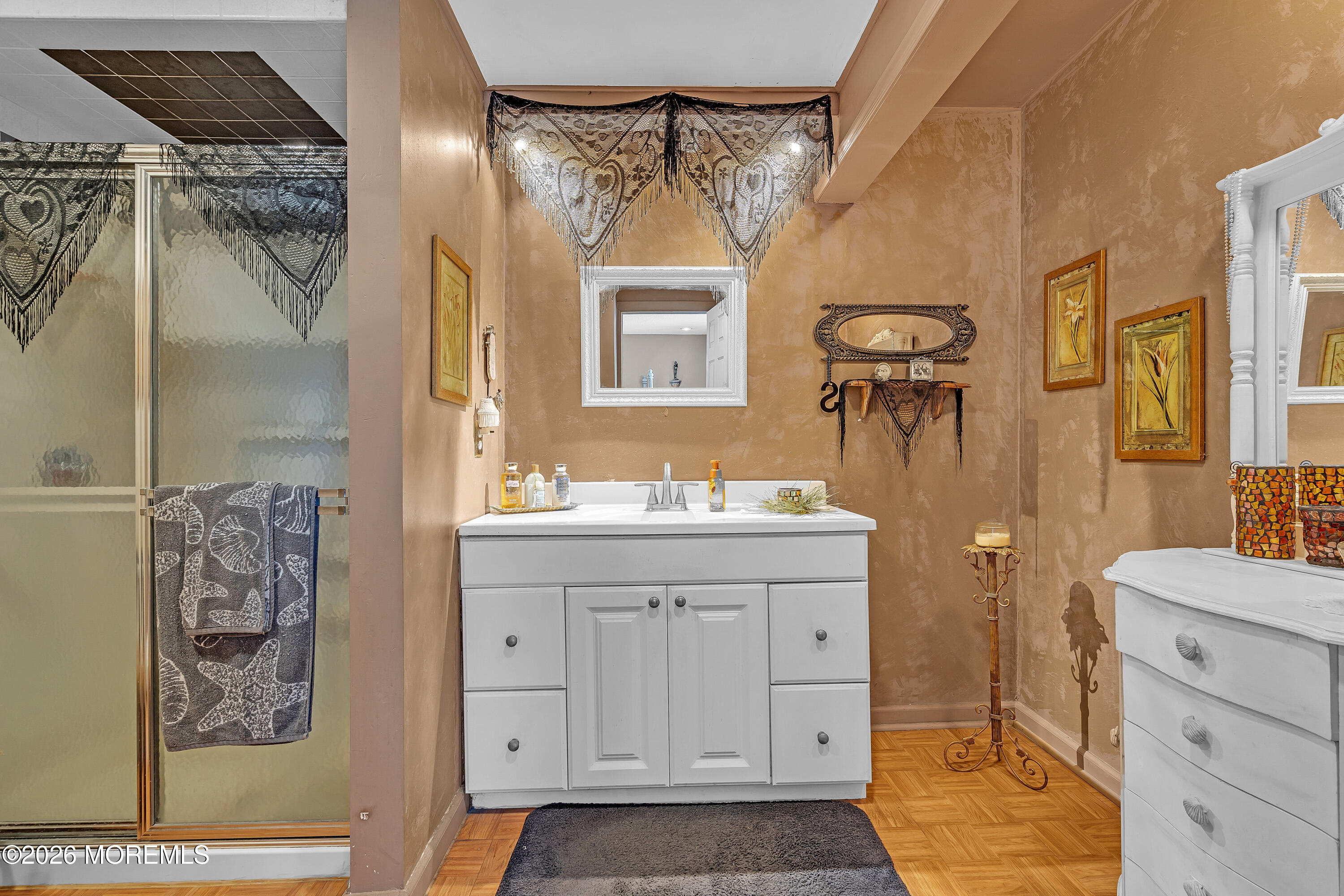 2 Apache Drive Toms River, NJ 08753 - Photo 60 of 75 a bathroom with a sink mirror and a shower