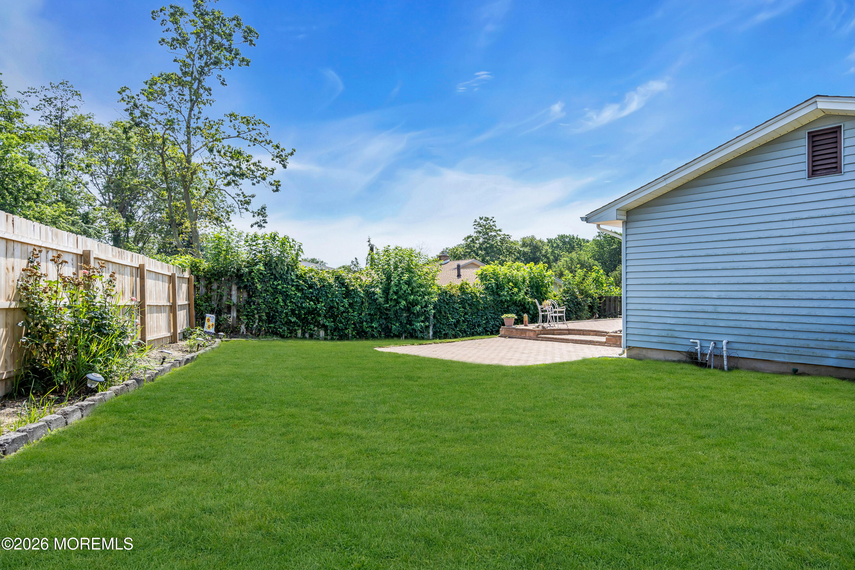 2 Apache Drive Toms River, NJ 08753 - Photo 72 of 75 a view of a backyard with potted plants and large tree
