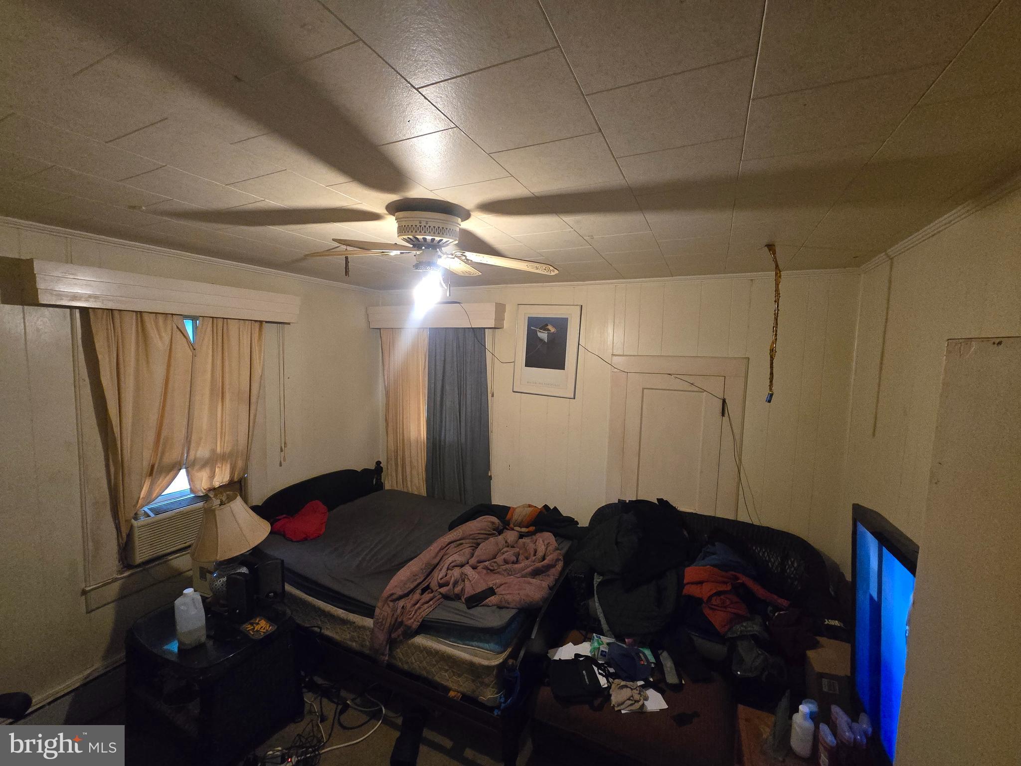 9258 Sharptown Road Laurel, DE 19956 - Photo 13 of 22 a living room with furniture and a chandelier
