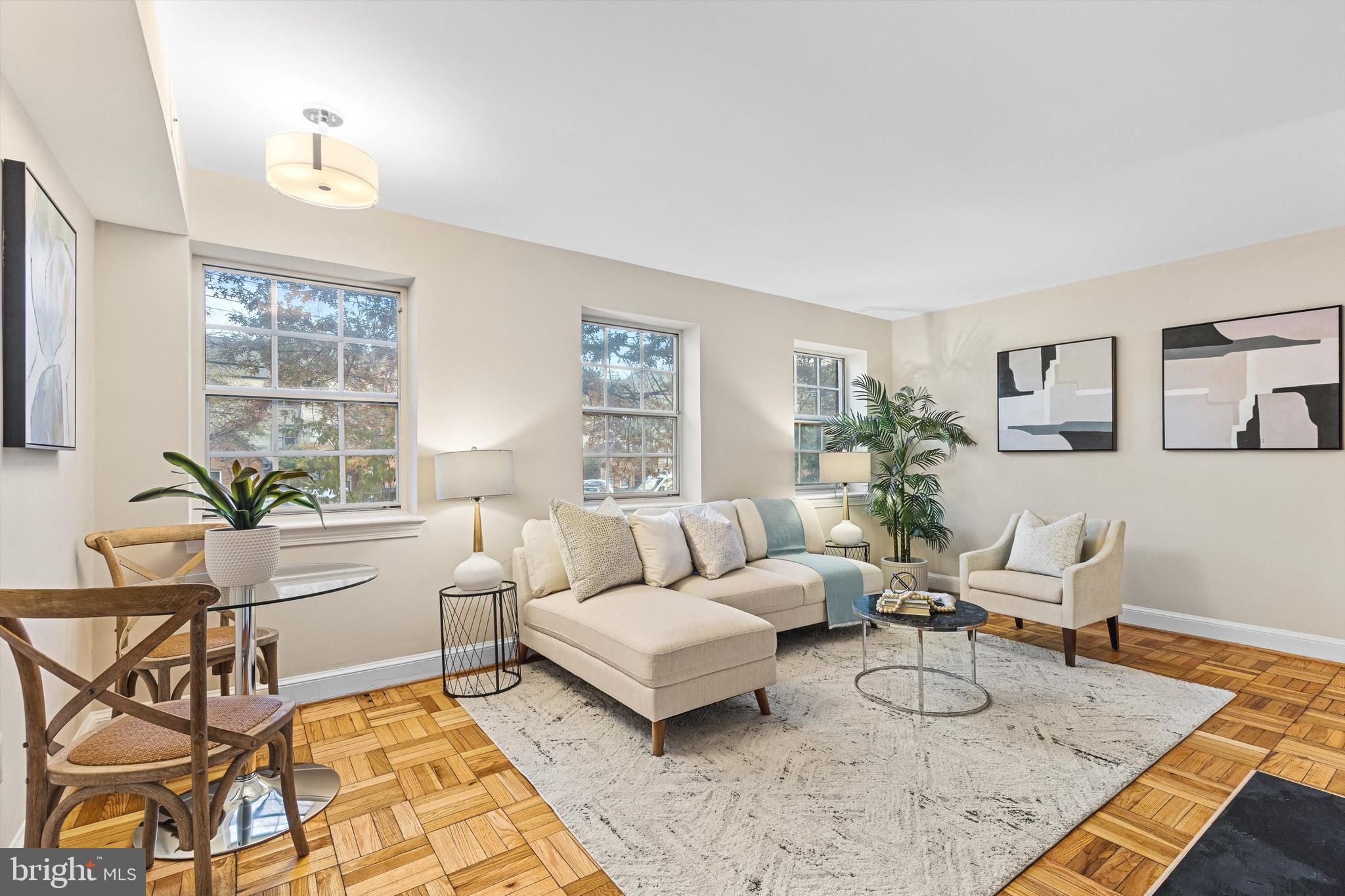2107 North Scott Street, Unit 67 Arlington, VA 22209 - Photo 3 of 15 Living/dining area- floors recently refinished