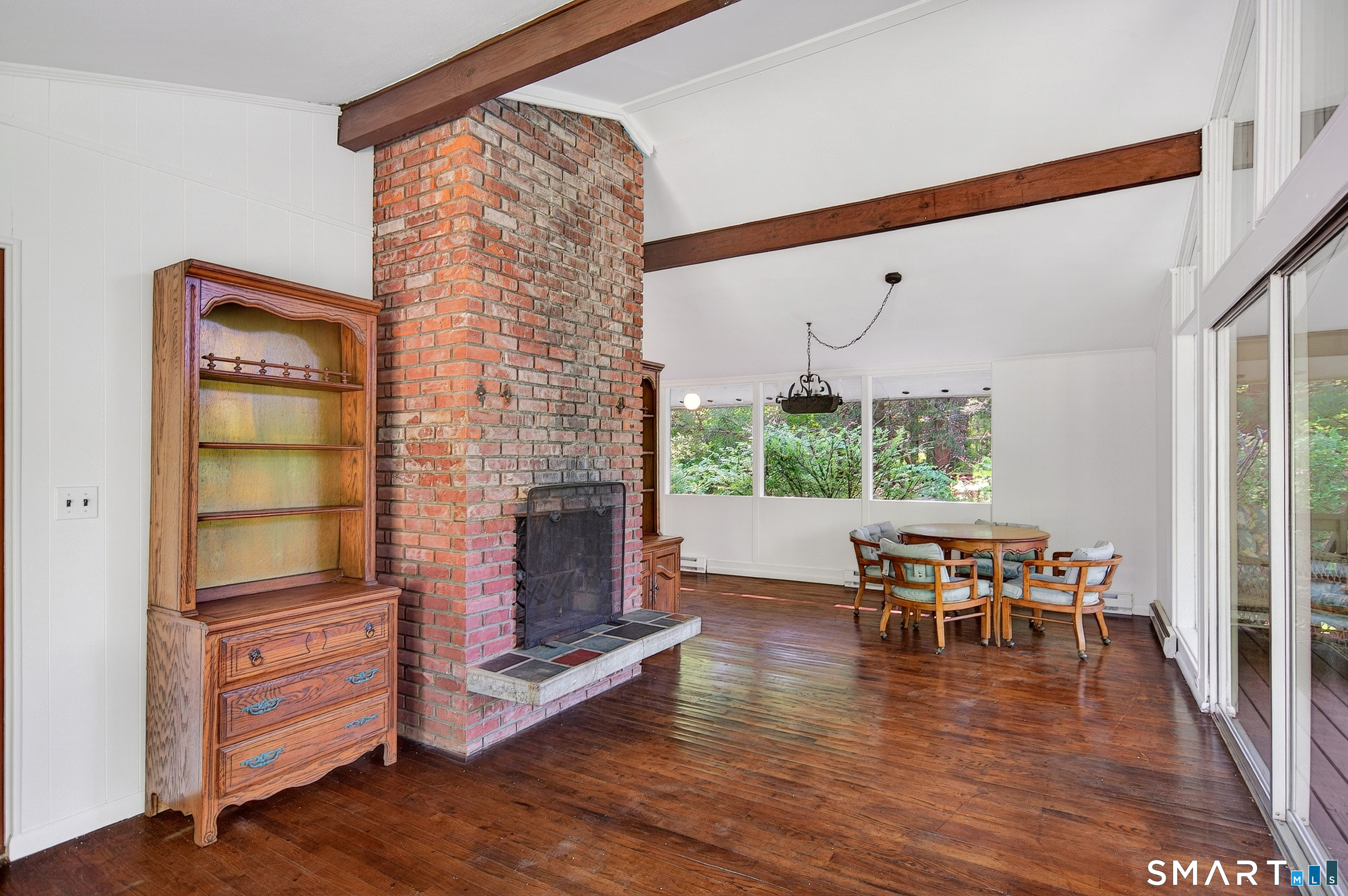 4 Pepper Pond Road Sherman, CT 06784 - Photo 9 of 33 a living room with furniture and wooden floor