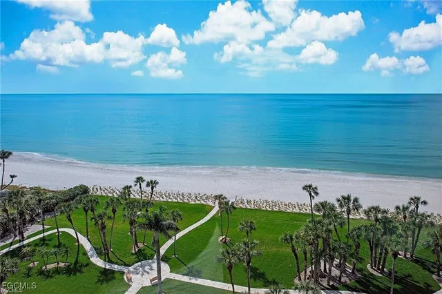 a view of a lake with a yard