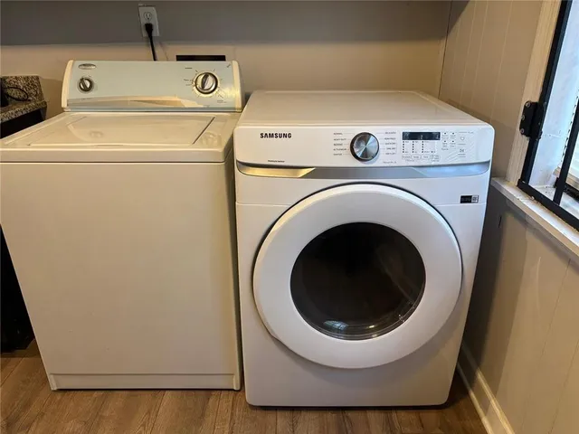 a utility room with dryer and washer