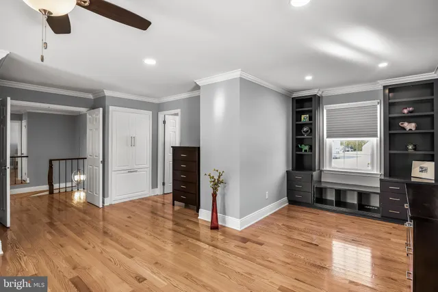 a view of kitchen with furniture and wooden floor