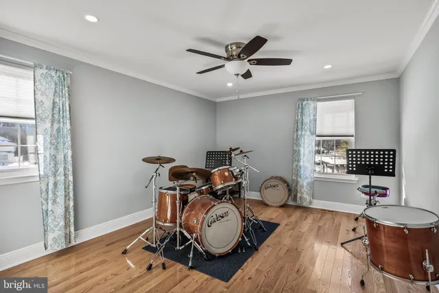 a work room with furniture and window