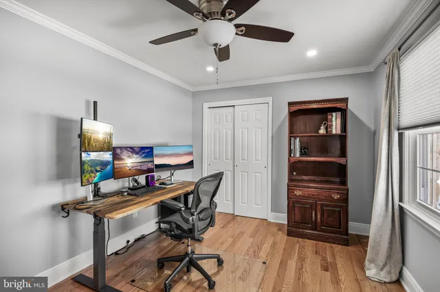 a view of a house with a parking space in front of house