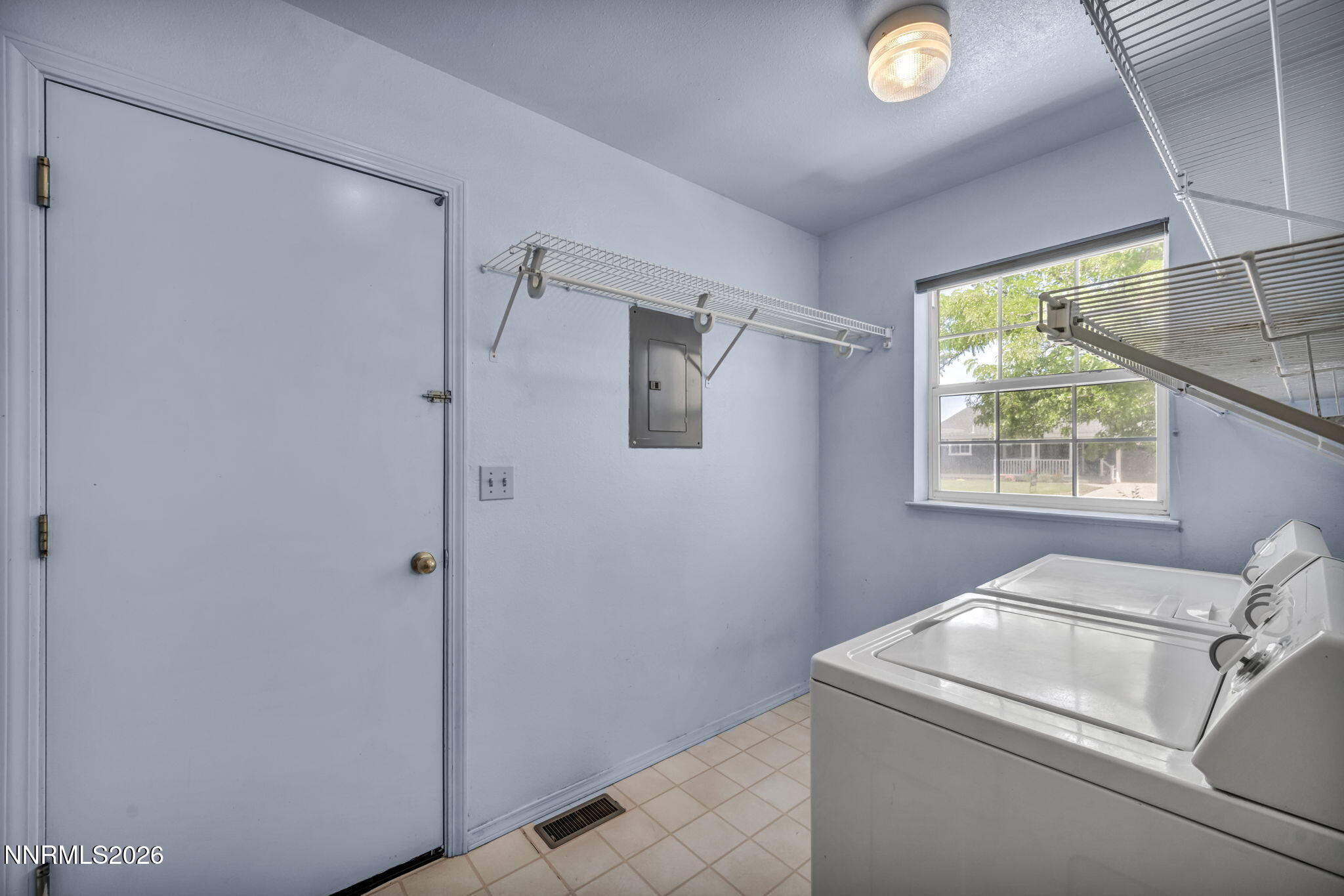 692 Lassen Way Gardnerville, NV 89460 - Photo 26 of 34 a utility room with dryer and washer